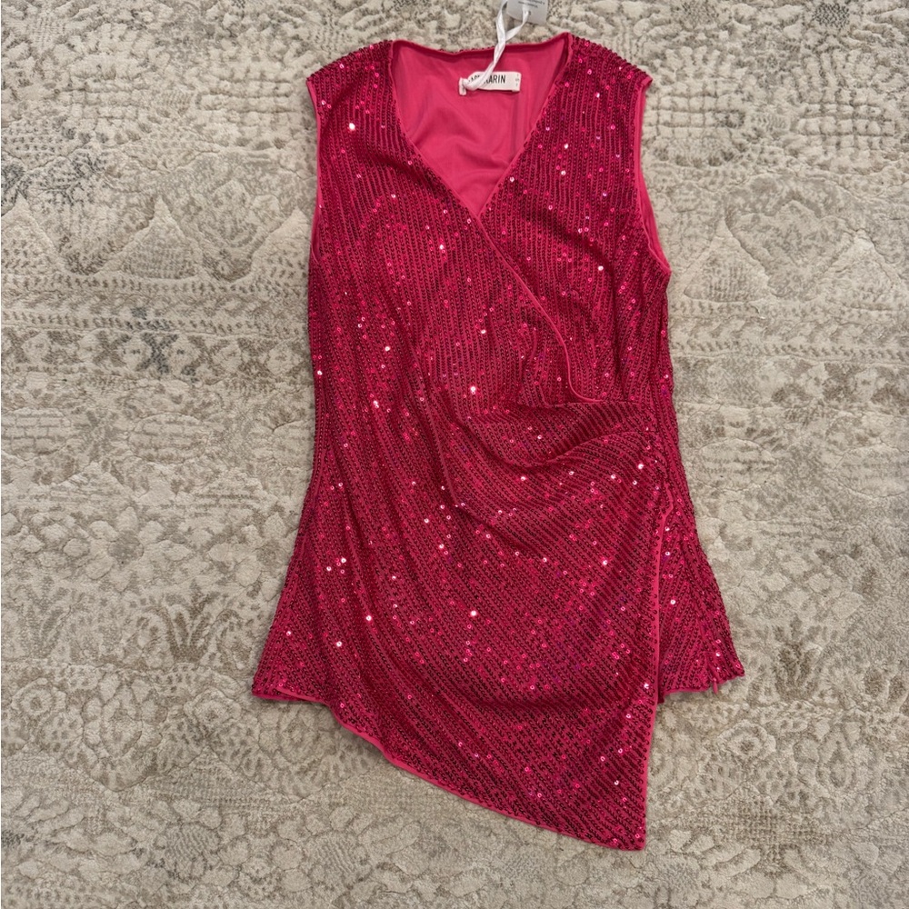Size small. Pink sequin . Asymmetrical hem . NWT